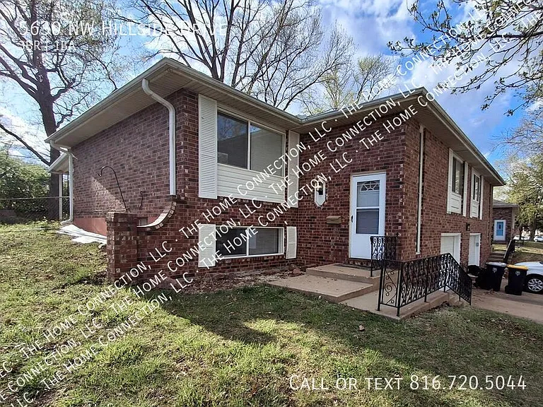 5630 NW Hillside Dr — Photo 1