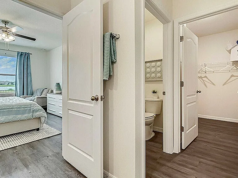 Step into your serene sanctuary, complete with modern furnishings and ample natural light.