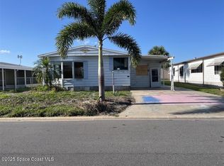 512 Puffin Dr, Barefoot Bay, FL 32976