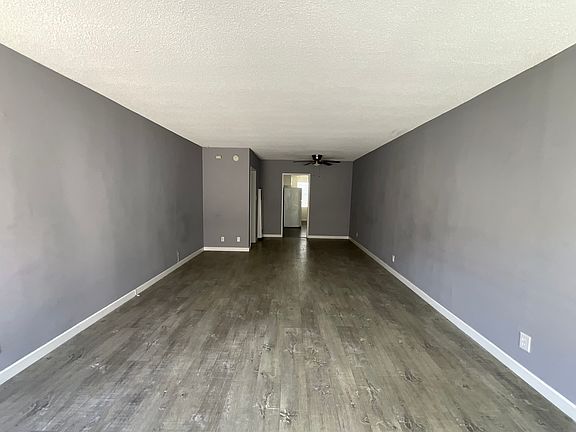 Living room another view with a sliding door to the outdoor patio