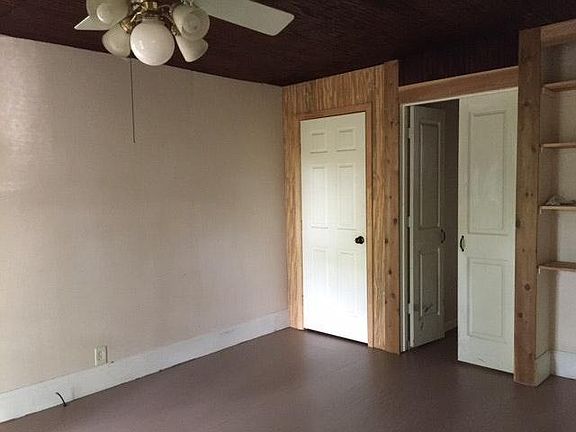 Bedroom leading to laundry