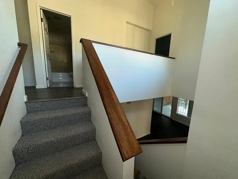second portion of stairs, hallway bath is located at top of stairs