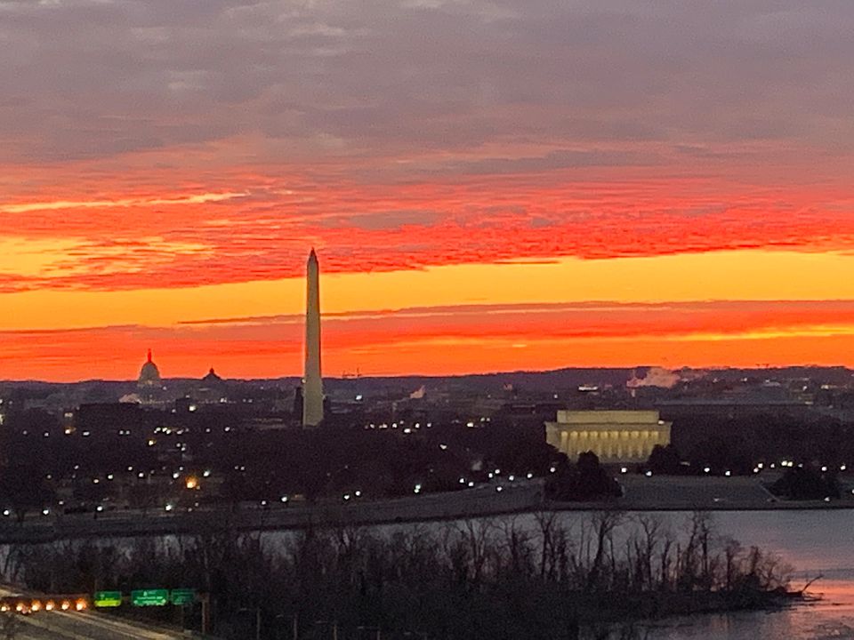 Beautiful sunrise over DC viewed from living room window.