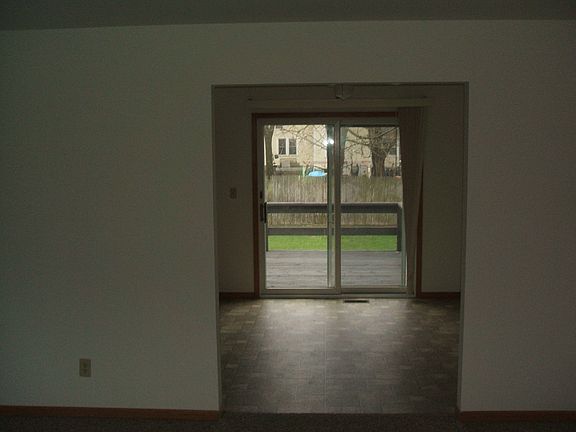 Dining space, patio door and deck