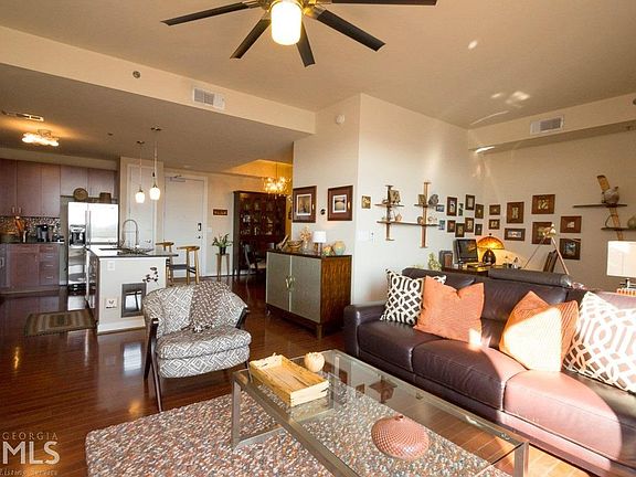 5th image of 711 Cosmopolitan Dr NE Unit 716
