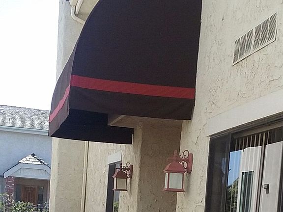 Awning covered Front door with stepless entry