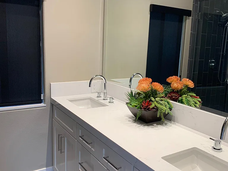 Custom bathroom with double vanity, Toto toilet with bidet and custom cabinets.