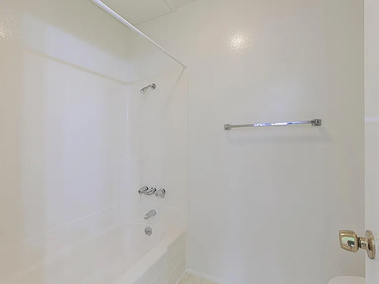 shower / tub and bathroom 2
