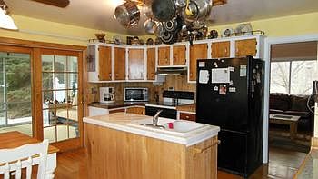 The kitchen is just off of the livingroom and has ample counter and cabinet space.