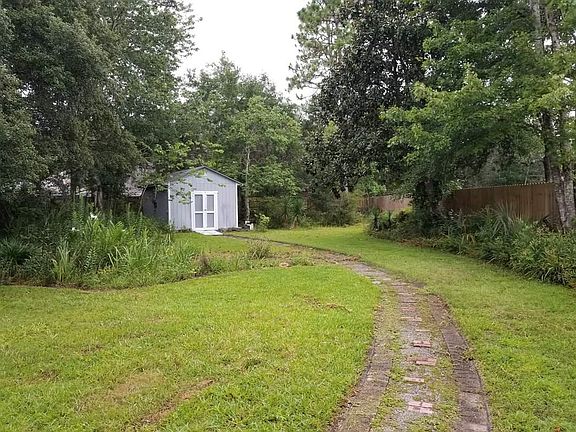 View from sun room to back yard.