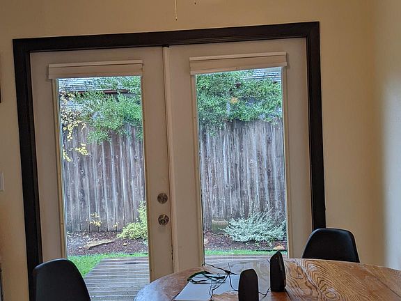 dining area, with french doors to private backyard