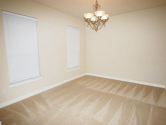 Nice size room that can be dining room or a study, take your pic and make it yours!