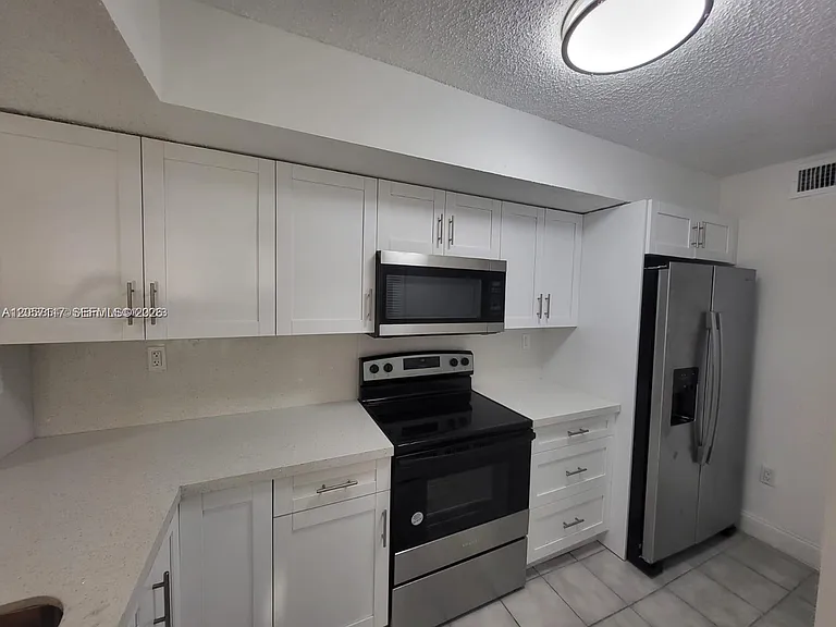 8670 SW 212th St #306 — Photo 17