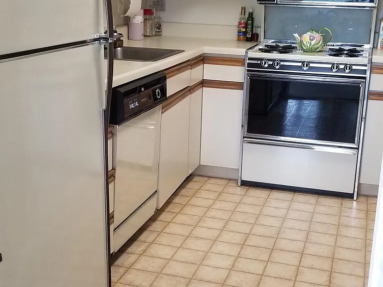 Fully stocked kitchen with full refrigerator, gas-stove, two ovens, microwave, dishwasher, sinkerator and plenty of cabinets and pantry closet!