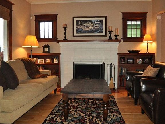 Enjoy the woodburning fireplace on those chilly Northwest nights. The wood bookcases and leaded wind