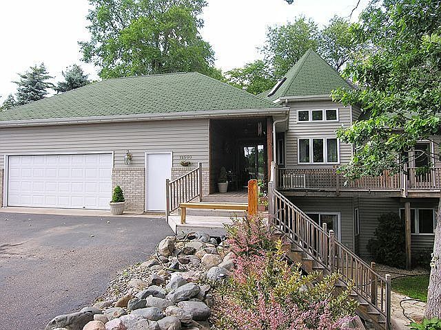 Front porch has walkway to bedroom/office deck