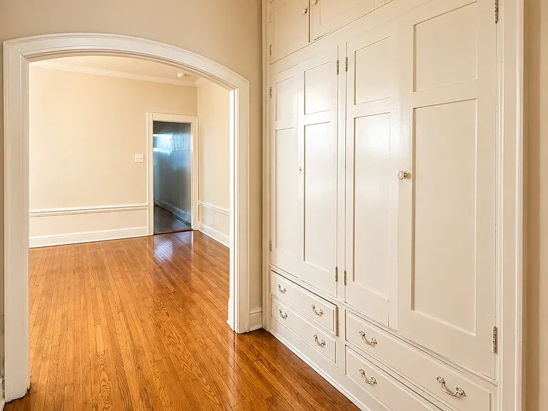 Storage in hallway leading to formal dining room