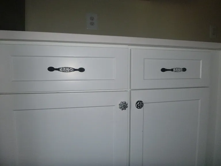 Upgraded soft close cabinets and decorative drawer and door pulls.