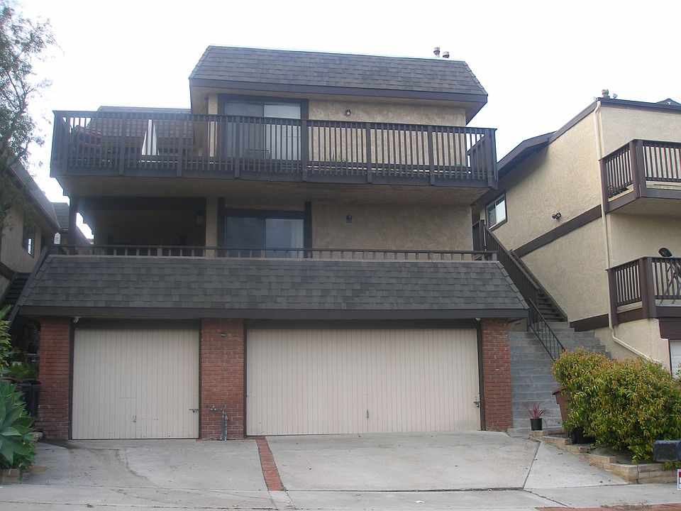 Lower unit over garages . This unit has the one car garage and space