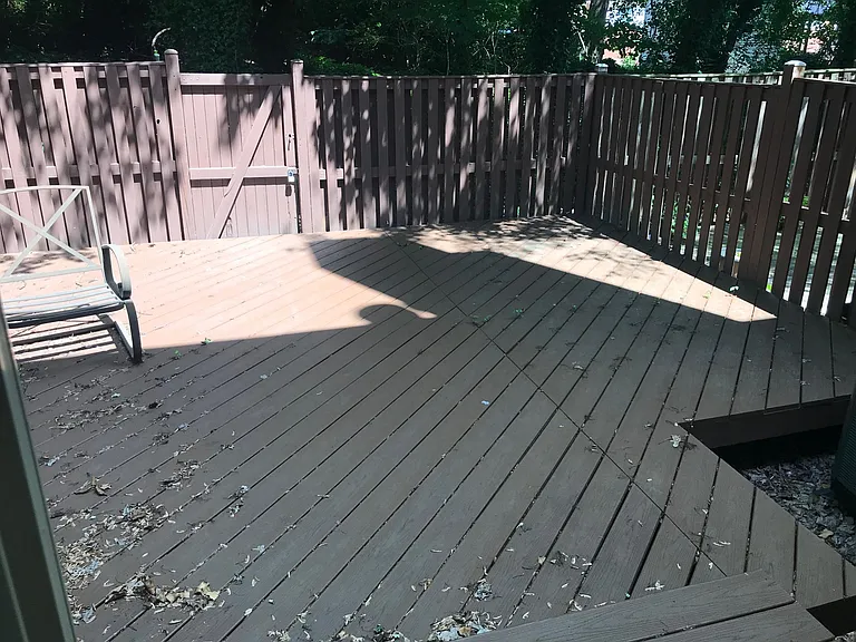 Fenced deck area (ground level)