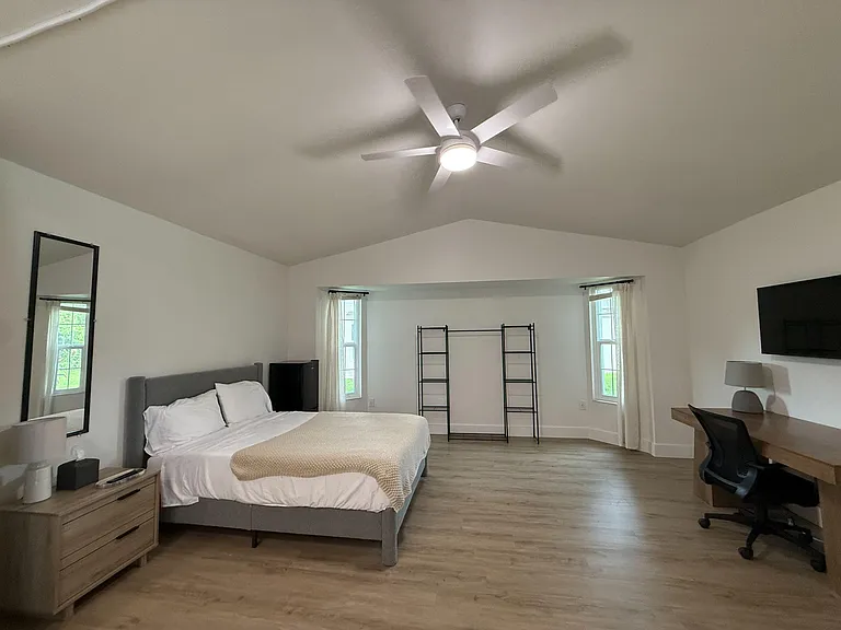 view of large room with two windows