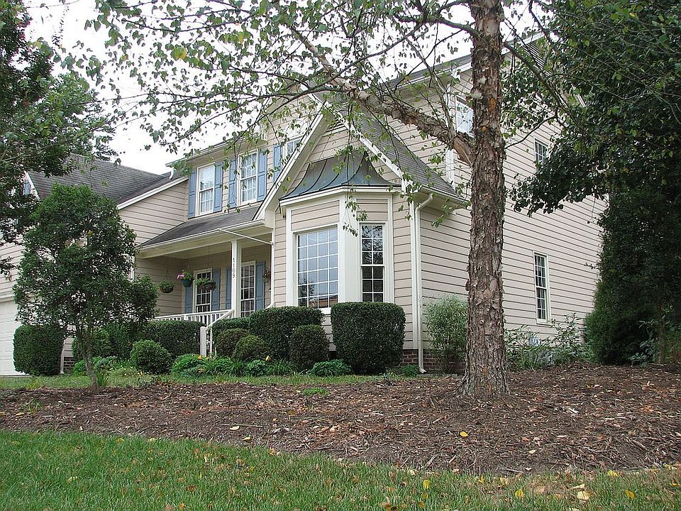 Beautiful landscaping in front and back of this warm and inviting home.