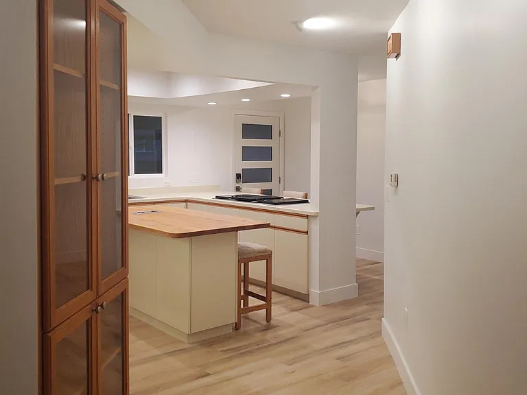 New lighting throughout home. Kitchen with island 7 bar stools .