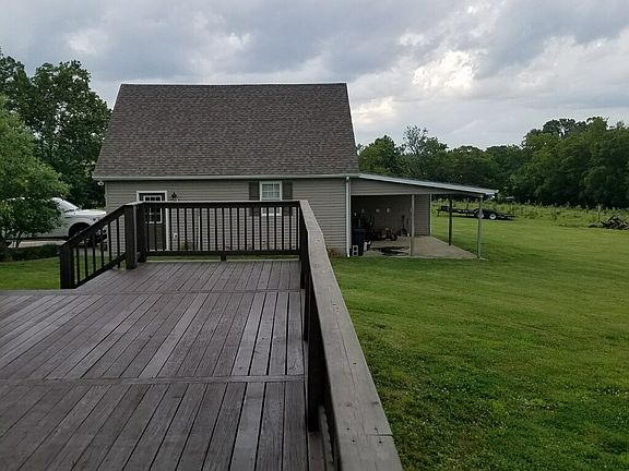 Deck, detached garage, shed