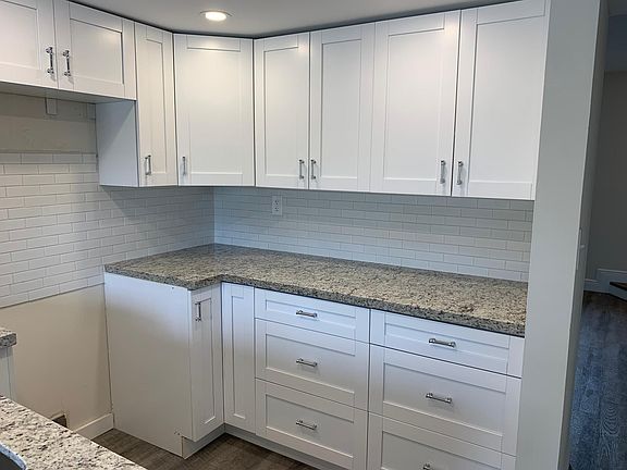 New kitchen cabinets...stainless steel appliances coming soon.