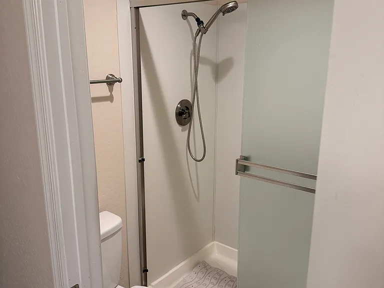 Primary Bathroom Shower and Toilet