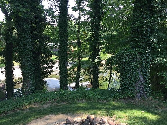 Backyard overlooks lake/dock