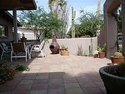 Front Courtyard: Desert Landscaping, Satillo Tile, Planters