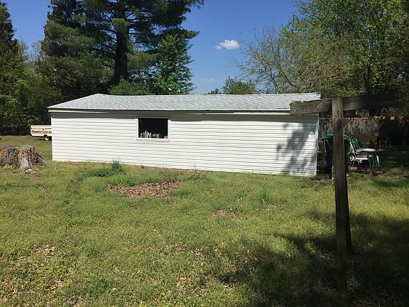 Long garage for extra car, truck, storage, etc.