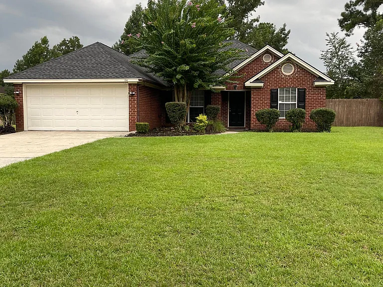 Lovely home in quiet neighborhood, covered entryway. Big 2 car garage.