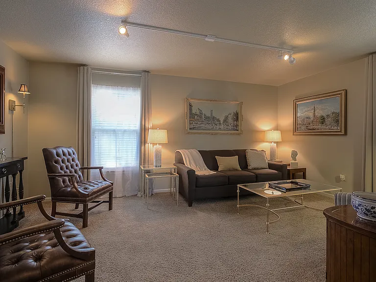 Living room - decor from previous occupant. ** NOT FURNISHED **