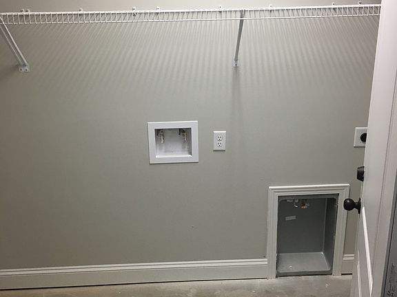 storage or 2nd laundry room off of the garage