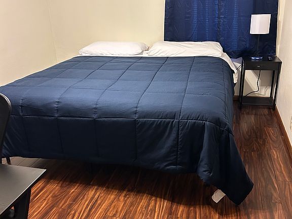 This is bedroom #2. It has a king bed with a comfortable pillowtop mattress!
