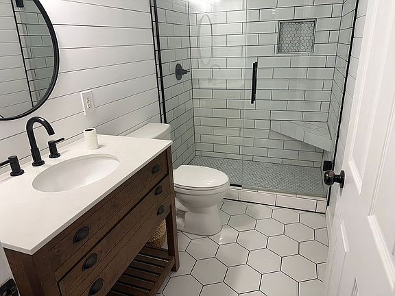 Remodeled second bath.