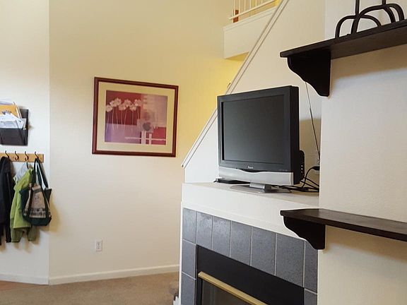 gas fireplace, living room open to second floor