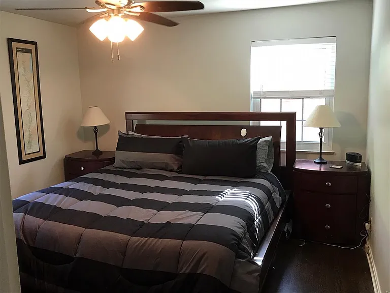 Back bedroom with king size bed