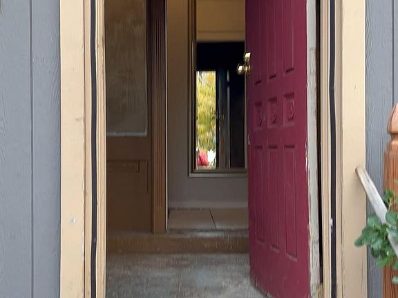 video of entrance, family room and kitchen