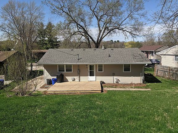 Large deck fenced backyard