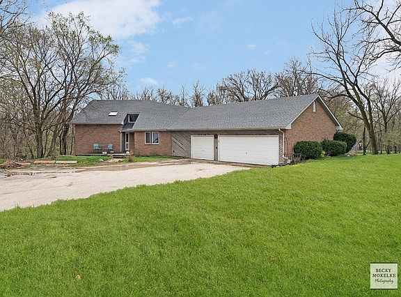 Newer roof~Huge, attached 3+ heated garage!