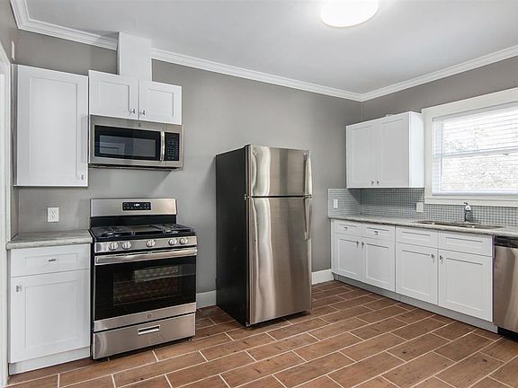 Unit 1 - Kitchen with new stainless steel appliances