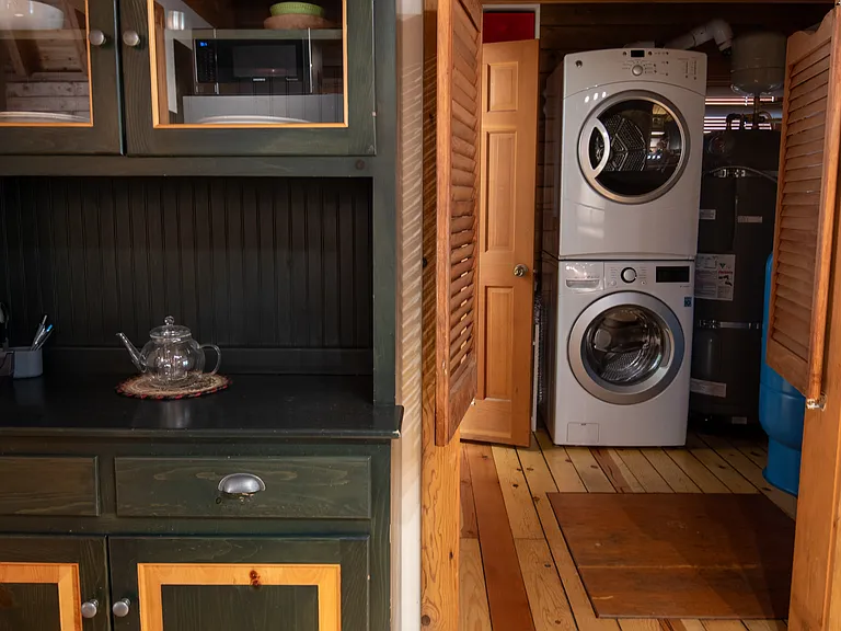 Kitchen looking into Laundry Room and half bathroom door