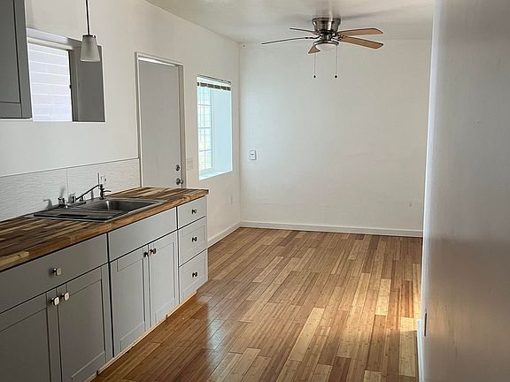 Entry, Living area, and Kitchen.