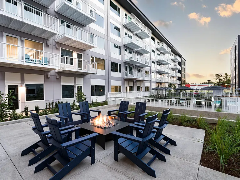 Cozy up at the outdoor fire pit at Modera Raleigh Hills _ the perfect spot to relax, connect, and enjoy the glow of elevated living.