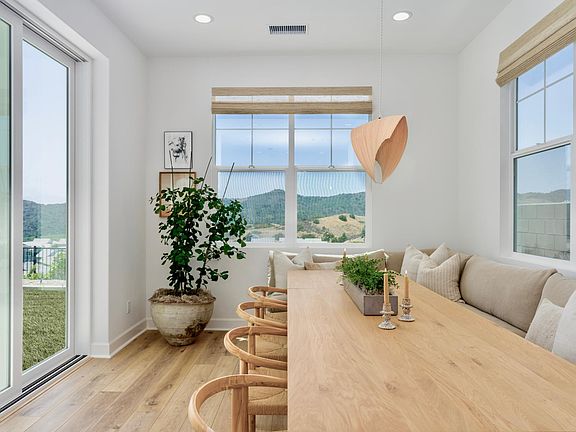 Automated lift blinds in dining room