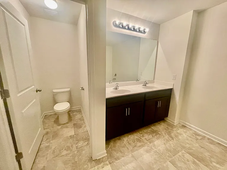 Master Bathroom double sink and toilet
