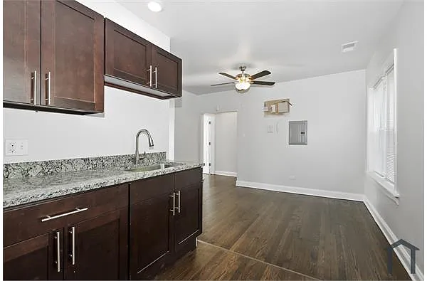 Building Photo - 7655 S Lowe Ave #1